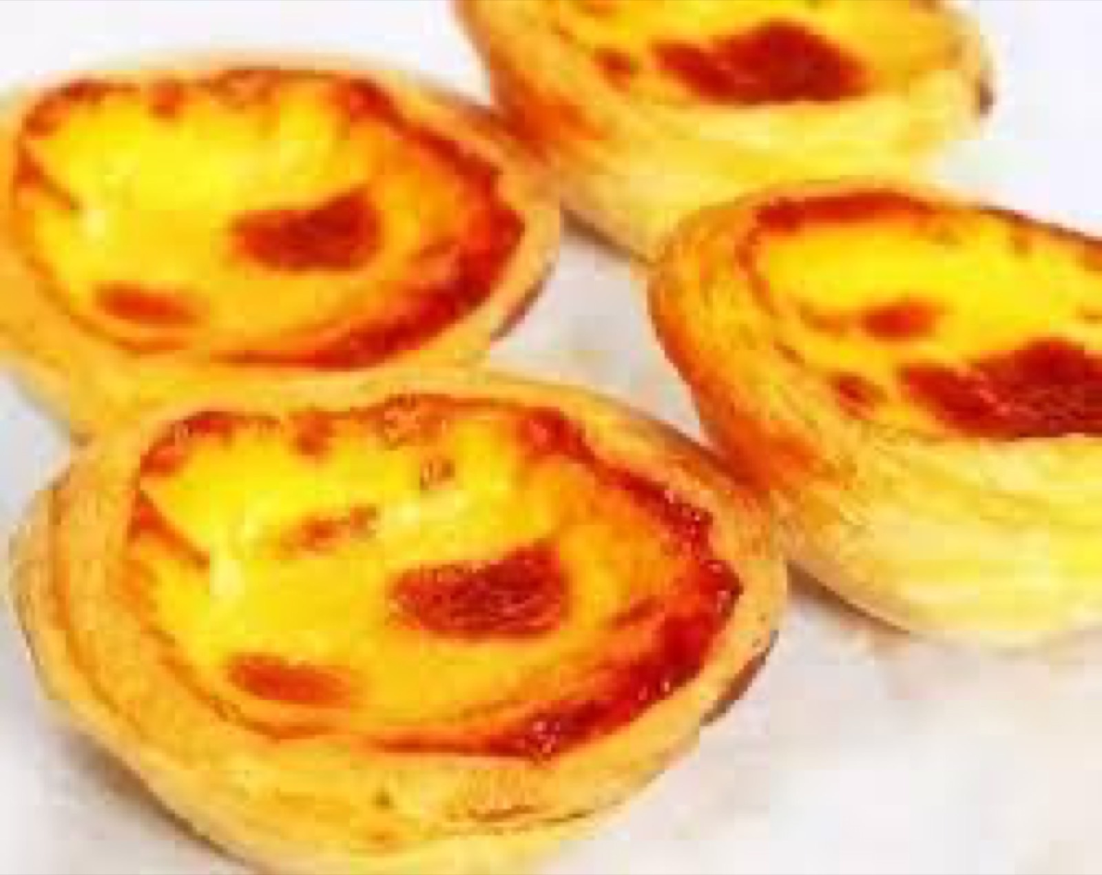 Golden egg tarts freshly baked at Purity Kitchen
